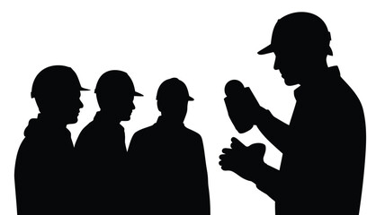 Silhouettes of construction workers discussing on site