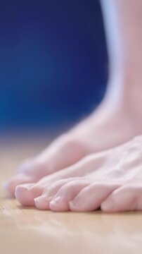 Person feet with fallen arch spin around