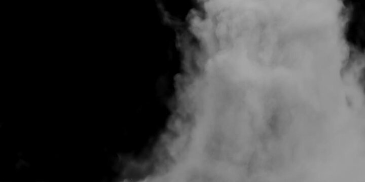 Smoke floats in slow motion in space against a black background.