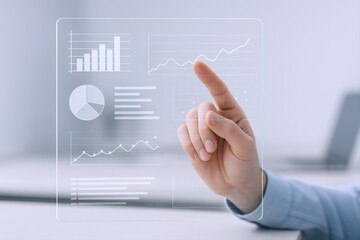 Interactive Data Visualization: Hand Touching Digital Screen Displaying Financial Charts and Business Analytics