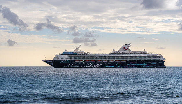Tenerife, Canary islands, Spain - November 11, 2021: Passenger ship Mein Schiff Herz of cruising travel company TUI in Atlantic Ocean, side view. Luxury sea voyage on a board of ocean cruise liner.