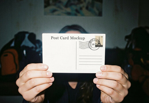 Postcard In Hands Mockup