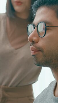 Vertical Screen : Closeup group Adult Asia male, female freelance meeting write prompt AI bot app program nomad, video game, talk strategy, discuss plan, user interface, data center desktop computer.