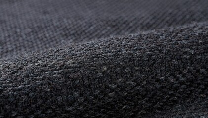 Close medium shot highlighting the dense weave of heavy weight interlock knit fabric demonstrating durability and richness in deep solid color tones.