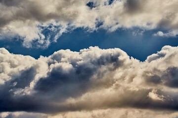 The contrast of bright sun and dark clouds highlights climate change and symbolizes the power of nature. Suitable for environmental initiatives, articles, and infographics.