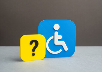 The disability symbol and question mark. What you need to know about the rights and social support for people with disabilities. Legalizing your status and access to benefits and protections