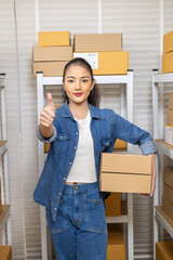 Small business warehouse inventory management, confident woman owner startup holding packages thumbs up, happy entrepreneur, online digital order, successful occupation, logistics, distribution store