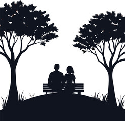 Silhouette of a couple sitting together under a tree or on a bench watching sunset.
