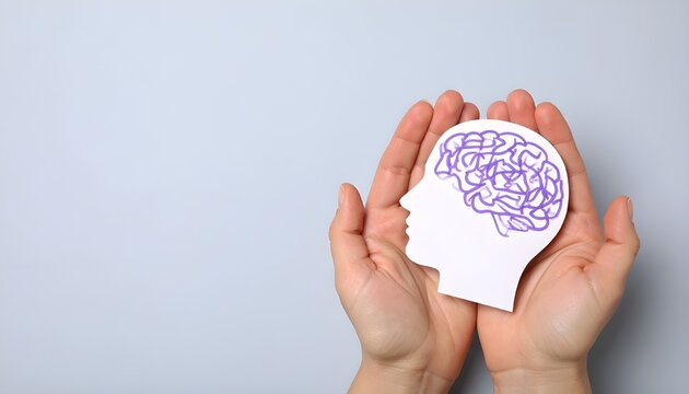 Illustration of the human brain with epilepsy in caring hands on a light blue background