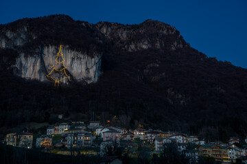 Village under the cliff illuminated for Christmas