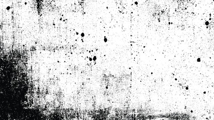 Fototapeta premium Grunge texture with black splatters and stains on white surface abstract background