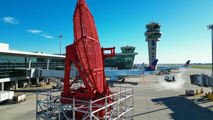 Airport radar and planes on tarmac