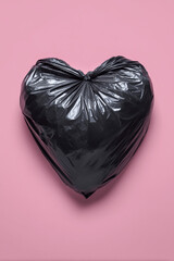 heart of black plastic bag, trash, garbage, love, passion, romance, romantic, pink background, portrait format, photorealistic