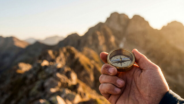 雄大な山々を背景に、手にした黄金のコンパスが進むべき未来を指し示しています。困難な挑戦を乗り越え、頂点を目指すビジネスリーダーの強い意志と成功へのビジョンを表現した一枚です。