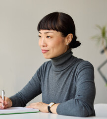 Business people having a meeting in the office. Teamwork and success concept, portrait of a smart young businesswoman