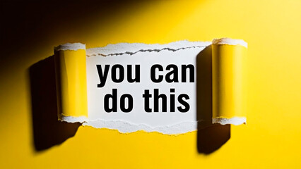 A motivational message on a torn paper for the concept of Business encouragement