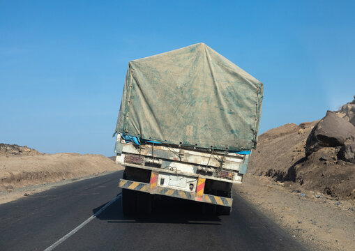 Overloaded truck coming from djibouti port, Afar region, Semera, Ethiopia