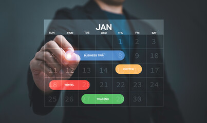 Business planning and schedule management concept with digital calendar interface and hand selecting dates symbolizing time management, organization, appointment planning and work life balance.