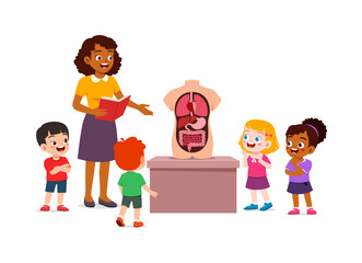 African American teacher happily explaining human anatomy to an excited diverse group of children with a body model