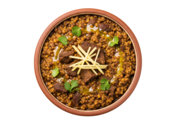 top view spiced lamb dish in clay pot with herb garnish