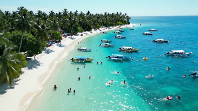 Beach with boats and people in water