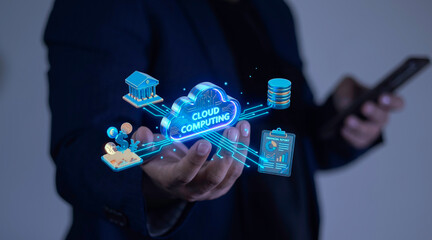 image of businessman holding cloud computing hologram connected to banking, financial report, and database icons. Concept of fintech and digital economy.