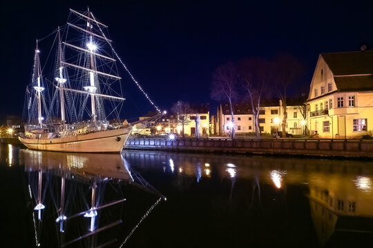 Sailing boat anchored orr moored in old town of Klaipeda, Lithuania