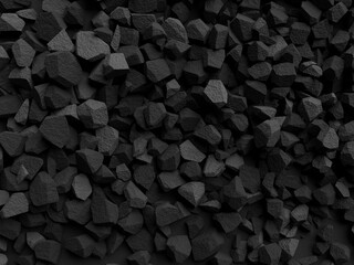 Close up of a dark pile of small, angular stones creating a textured background