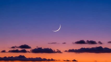 A serene crescent moon glows brightly against a beautiful twilight sky with soft, colorful hues