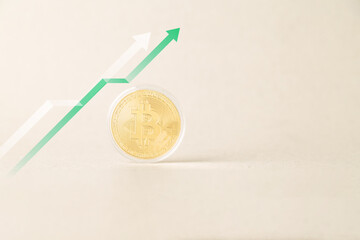 Gold Bitcoin coin with a rising green arrow graph on a neutral background. Concept of cryptocurrency price increase, bullish market trend, financial growth, investment success, and digital wealth.
