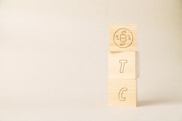 Wooden blocks stacked vertically showing BTC lettering with a Bitcoin icon, symbolizing cryptocurrency growth, blockchain technology, digital finance, and strategic investment in the crypto market.