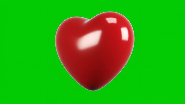 Red heart shape on green background