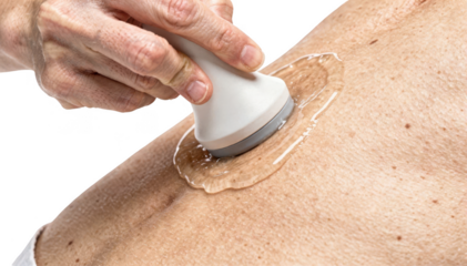 Closeup of a sonographers hand applying gel with an ultrasound probe on a patients right upper abdomen showing detailed scanning procedure on a bright white background.