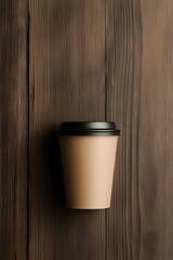 Brown paper takeaway coffee cup with black lid on dark wooden table