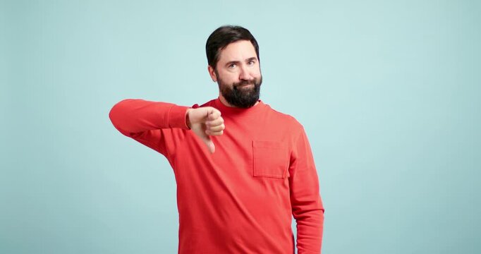 Bearded man showing different negative hand gestures
