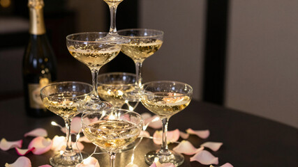 Champagne Tower With Rose Petals