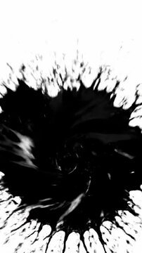 Black paint splatter on white canvas creates an interesting effect at an art studio in the afternoon