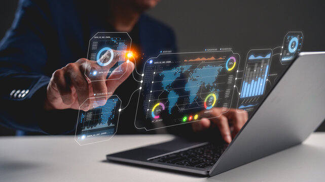 A person interacts with a holographic interface displaying data visualizations, suggesting advanced technology and data analysis. - Powered by Adobe