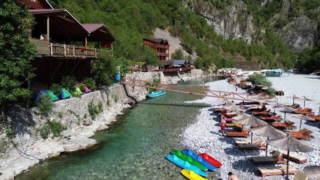 Stunning turquoise river in Shala Valley surrounded by steep mountains, Albania