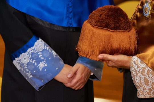 Academic ceremony with a doctor's birrete hat