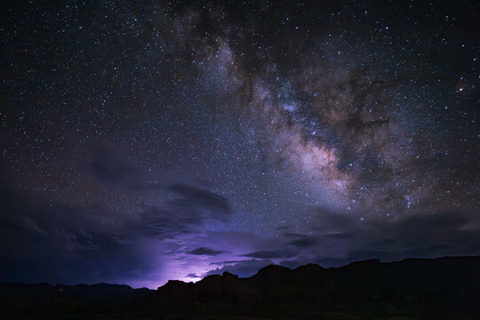 Dark skies, gathering clouds and a glow on the horizon in Texas