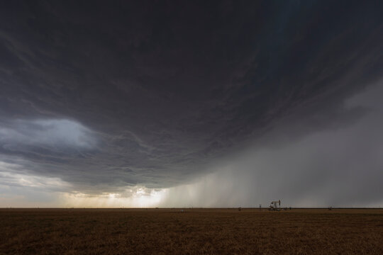 A developing High Base Supercell in the sky above the horizon