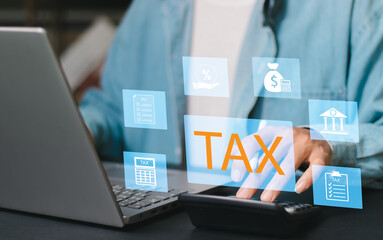 Tax concept.Man hand using calculator to calculate personal income tax return to pay taxes online. State tax. Financial research. data analysis, documents, reports, tax returns, calculations.