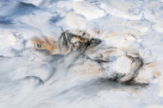 River water abstract, long exposure of river water flowing, impressionistic effect