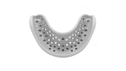 White dental impression tray with multiple holes on black background dental tray