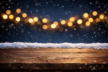Festive winter background with snow covered wooden surface and warm glowing lights creating cozy holiday mood