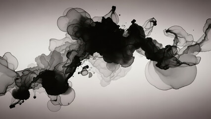 Dynamic black ink clouds spreading on white background