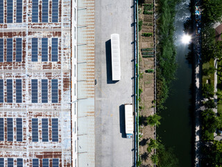 Overlooking warehouses and container trucks