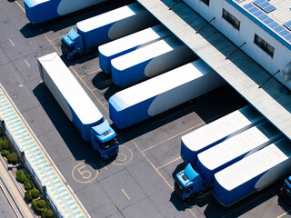 Overlooking warehouses and container trucks