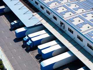 Overlooking warehouses and container trucks